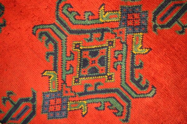 Antique Turkish Ushaq carpet red green blue close up